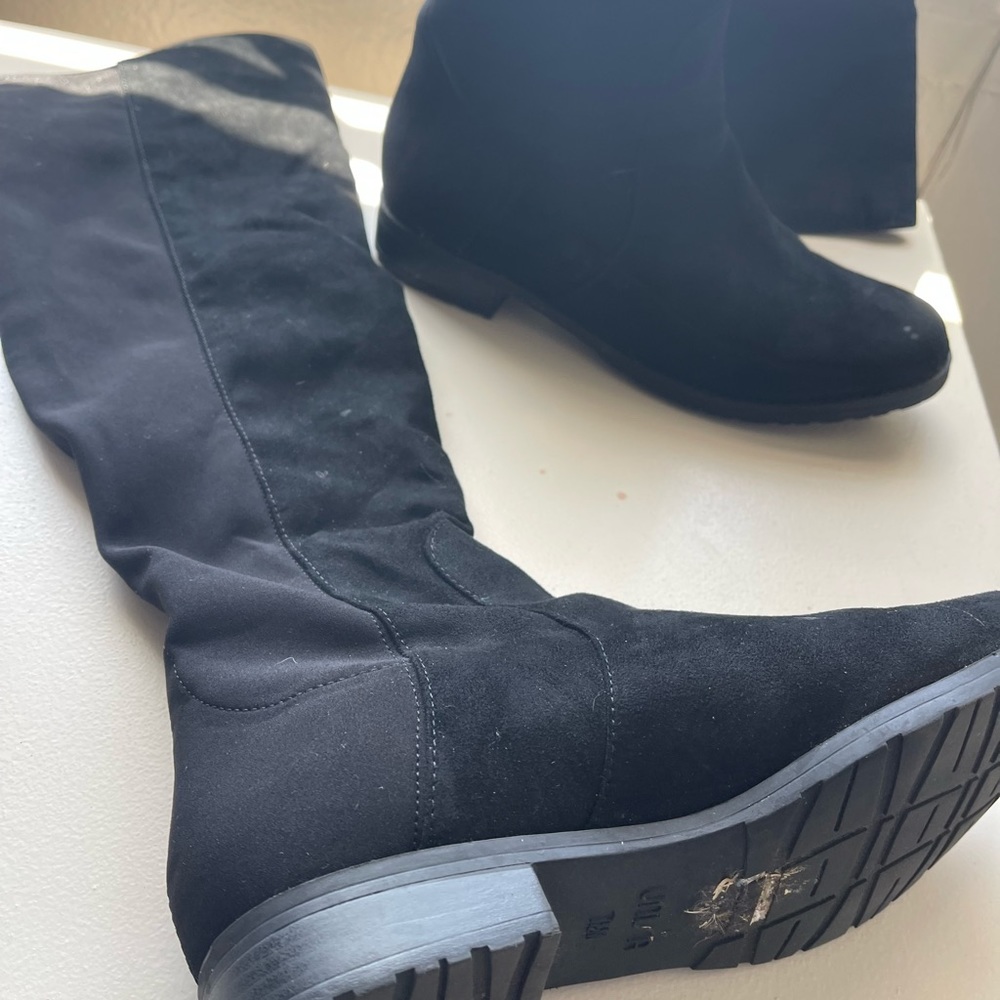 Over the knee black boots